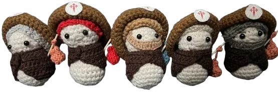 A group of handmade Tiny Pilgrim dolls